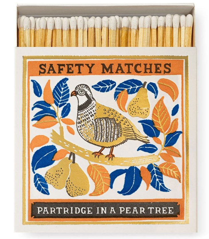 Matchbox with partridge in a pear tree design, made in England, with wooden matches.