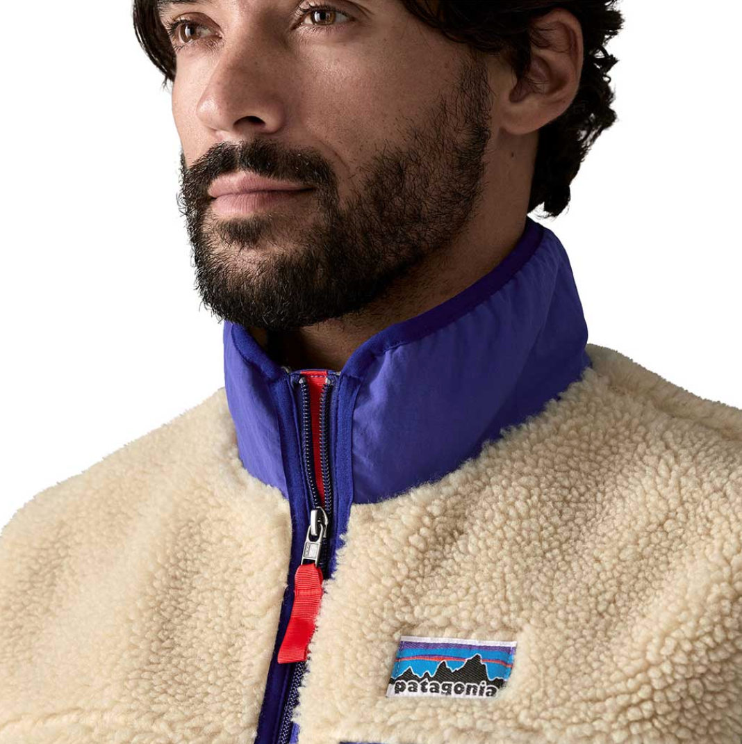 Versatile layering piece, Patagonia's Classic Retro-X Fleece Vest for modern gentlemen.