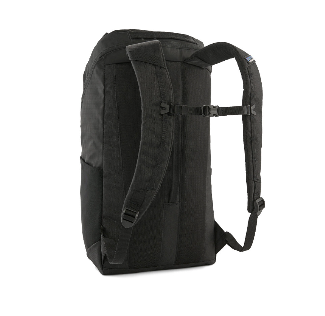 Open compartment of Patagonia Black Hole Pack 25L, spacious and functional in black.