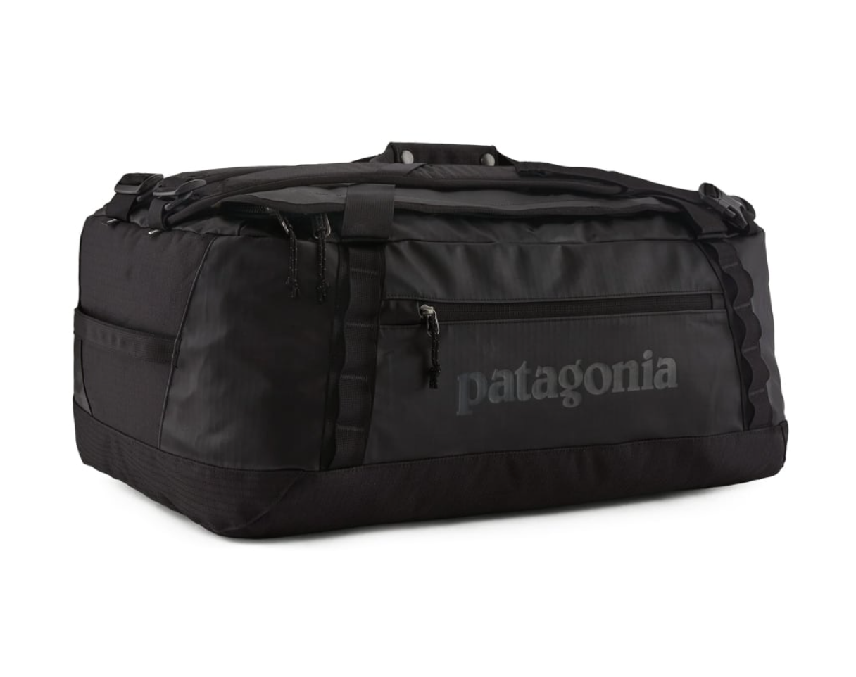 Black Hole Duffel 55L by Patagonia in black, versatile accessory for travel and daily use.