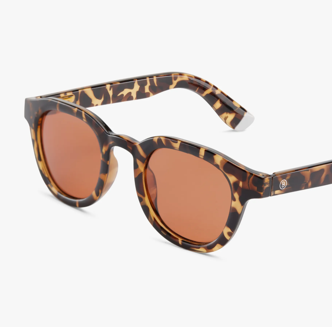 Side view of the Andy Glossy - Tortoise Sun sunglasses by Barner, showcasing their elegant design.