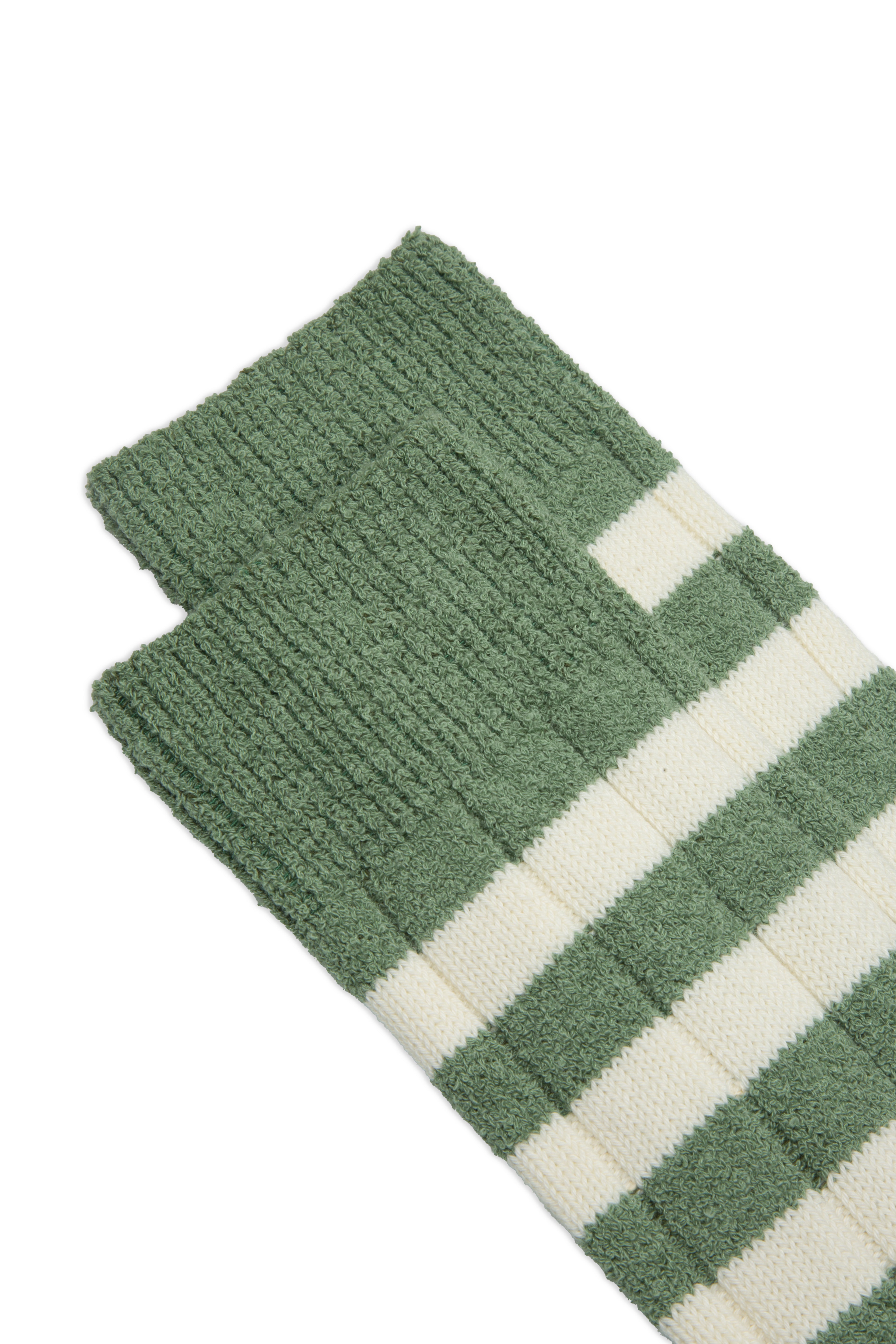 Close-up of green Taza Socks by Ant45, showcasing cotton, polyamide, and elastane fabric.