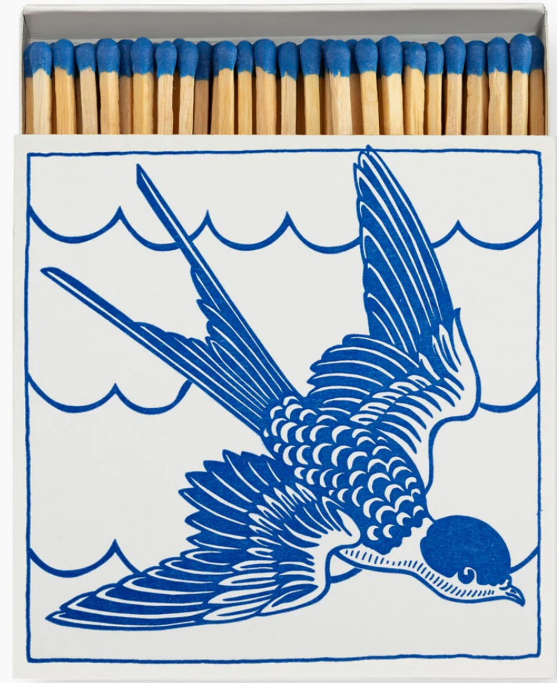 Matchbox with swallow illustration, made in England, printed cardboard box containing safety matches.
