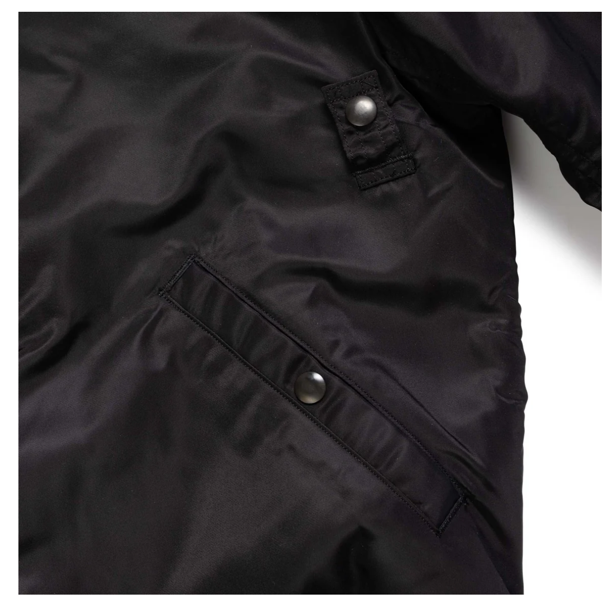 Black MA-1 Albert Turner & Co Model by Buzz Rickson's, forearm pocket.
