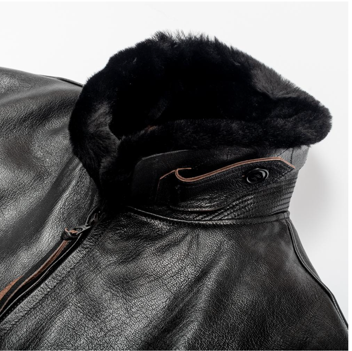 Detail view of Buzz Rickson's Black AN6552 Goatskin, featuring black hardware and knit accents.
