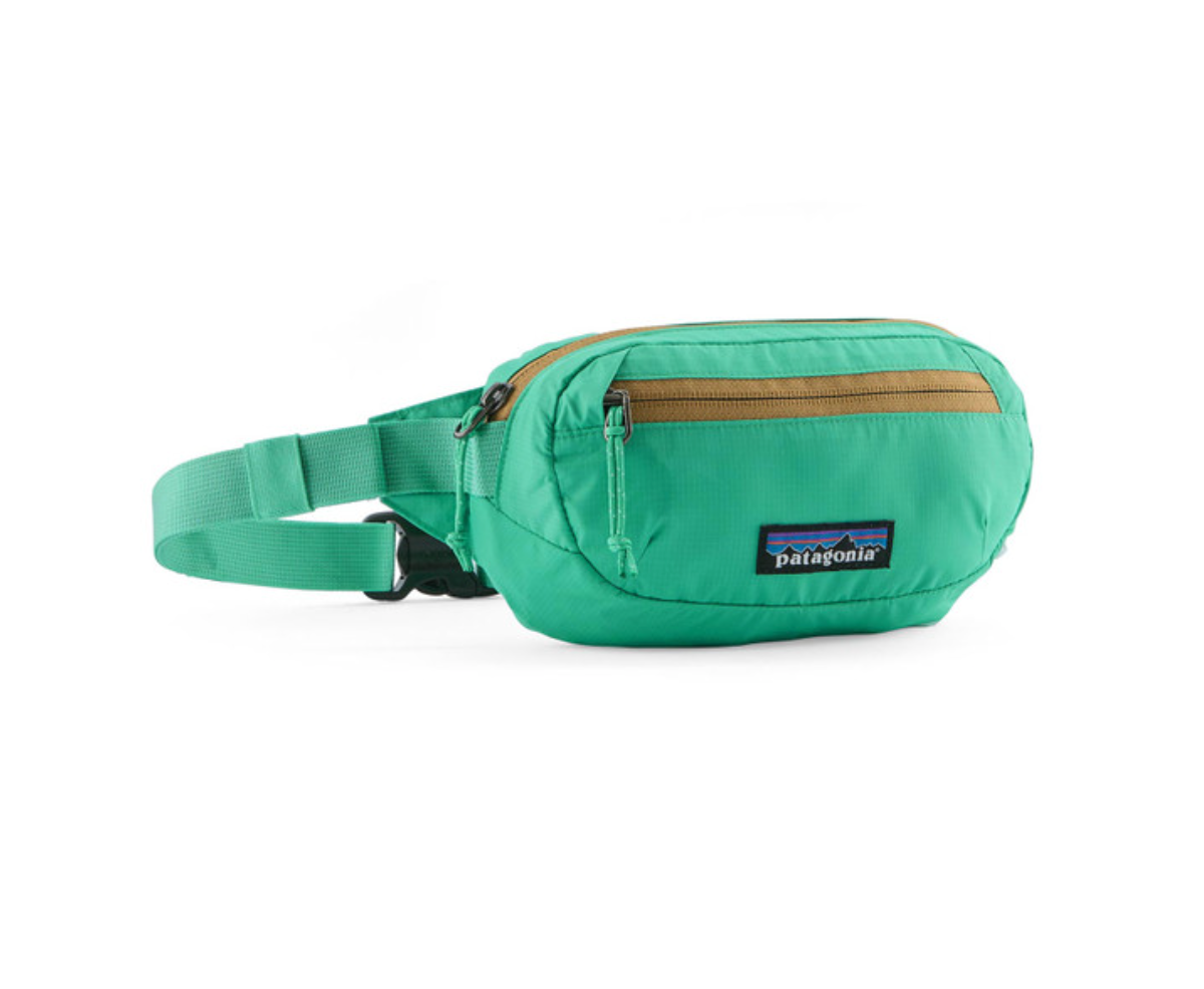 Patagonia Terravia Mini Hip Pack in Aqua Stone, demonstrating versatile style for all occasions.