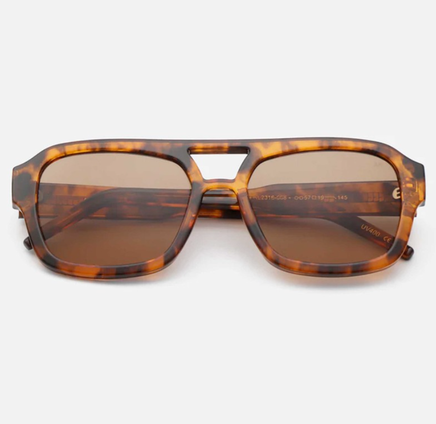 A. Kjærbede Kaya sunglasses detail in Havana, showcasing polycarbonate lenses and eco-friendly materials.