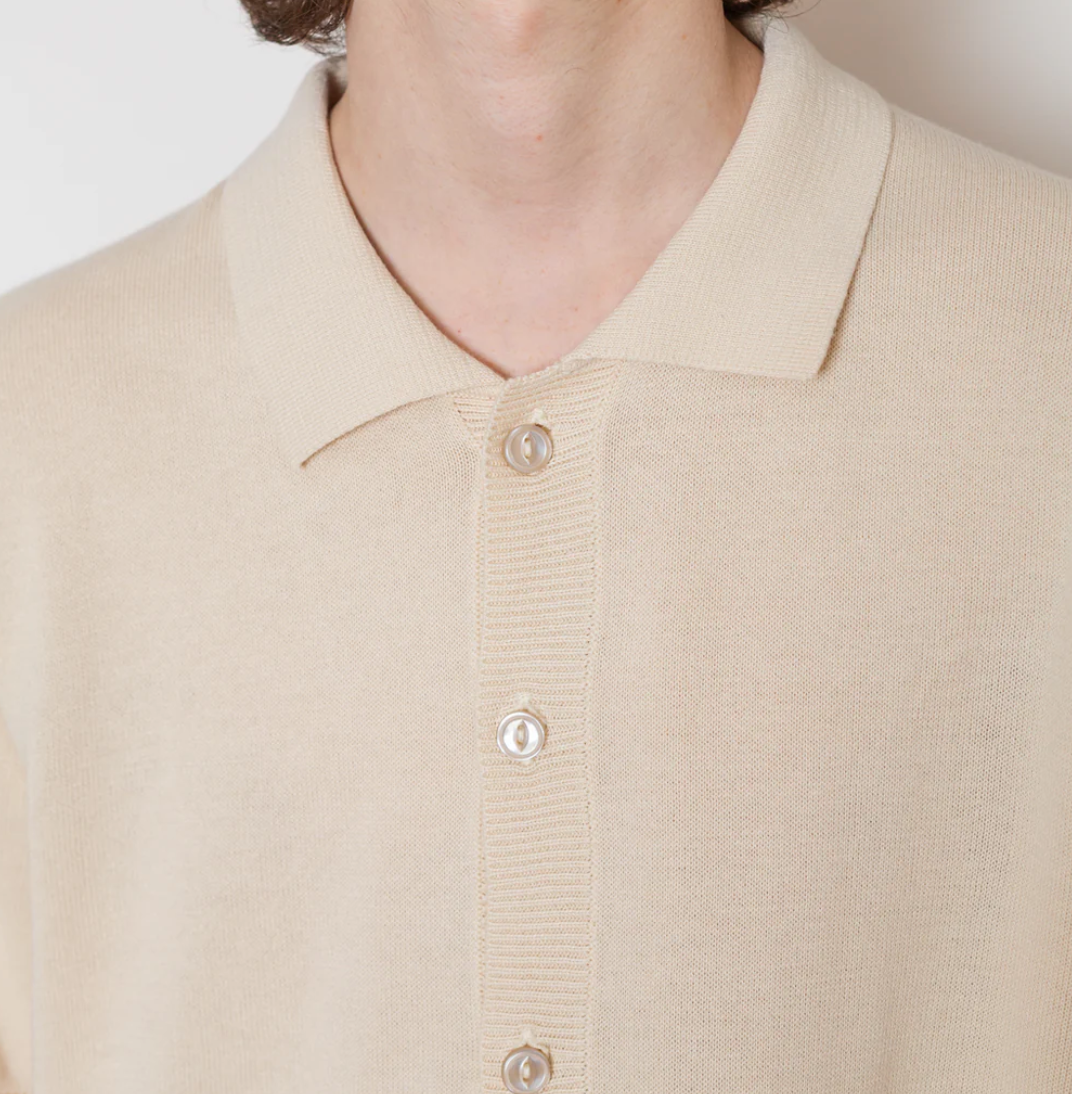 Side angle of the Otto Shirt Texture - Off White by Pittari, showcasing its elegance.